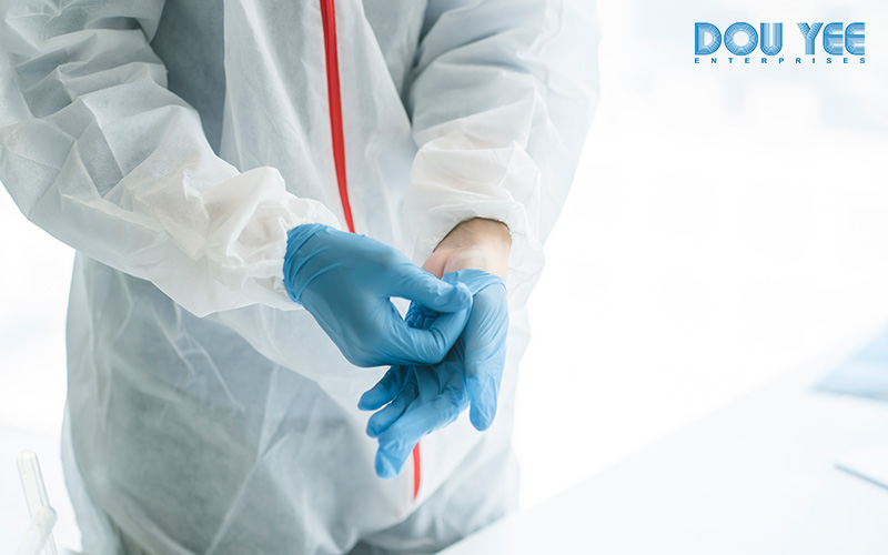 Man wearing full PPE suit for a cleanroom.